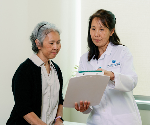 physician and patient talking